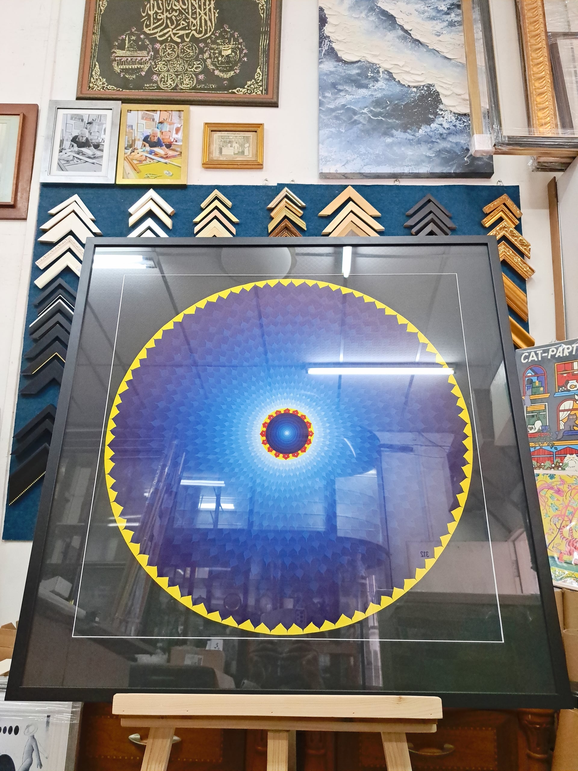 Religious thangka framing Singapore - Hindu artwork with matte black frame and clear glass protection