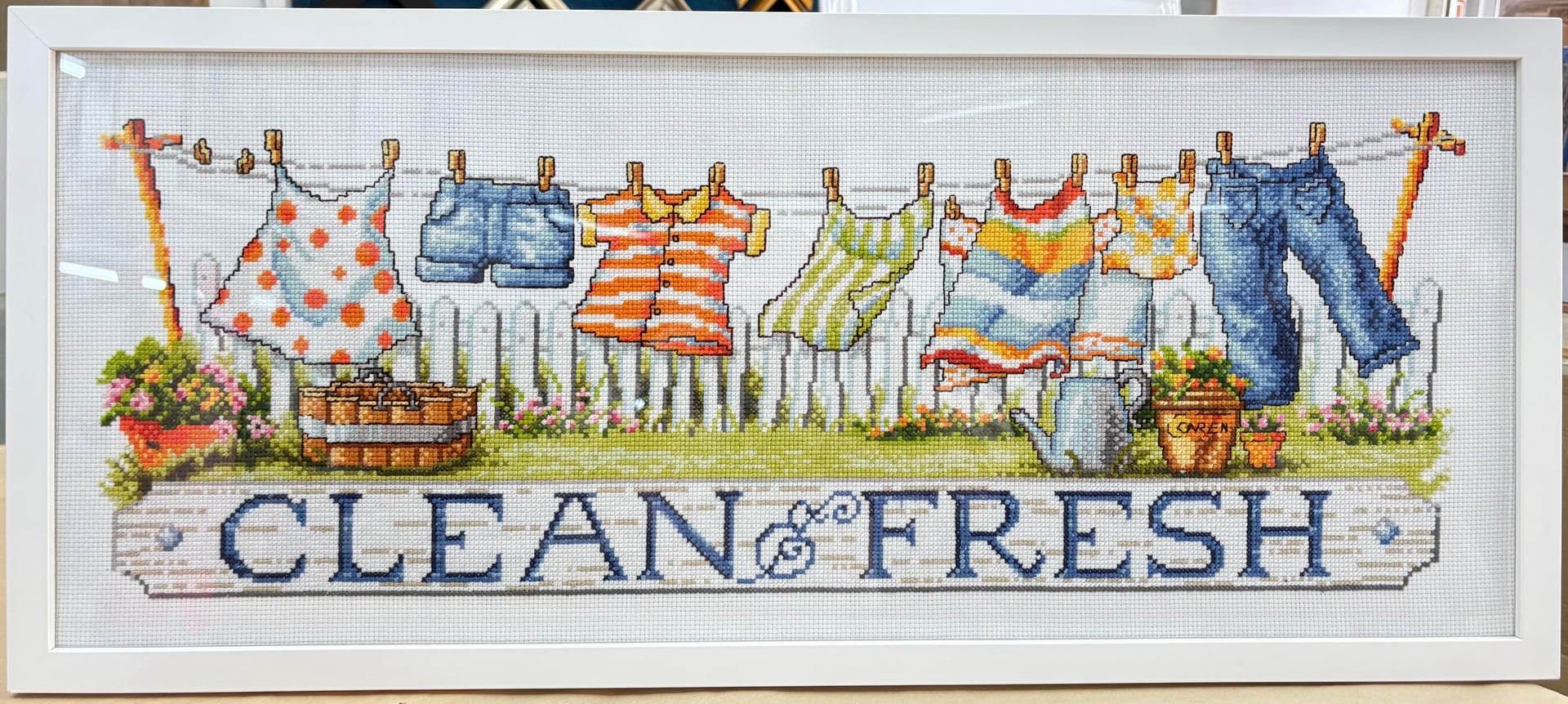 Professional framing for cross-stitch, embroidery, and needlework. Acid-free mat board prevents damage and discoloration.